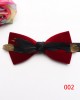 New style, solid-color, textured velvet bow ties for men with feather embellishments. Fashionable suit accessories and business bow ties available for wholesale.